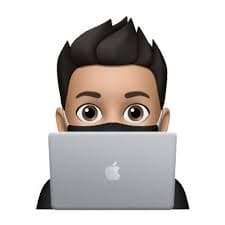 Person peeking from behind laptop screen